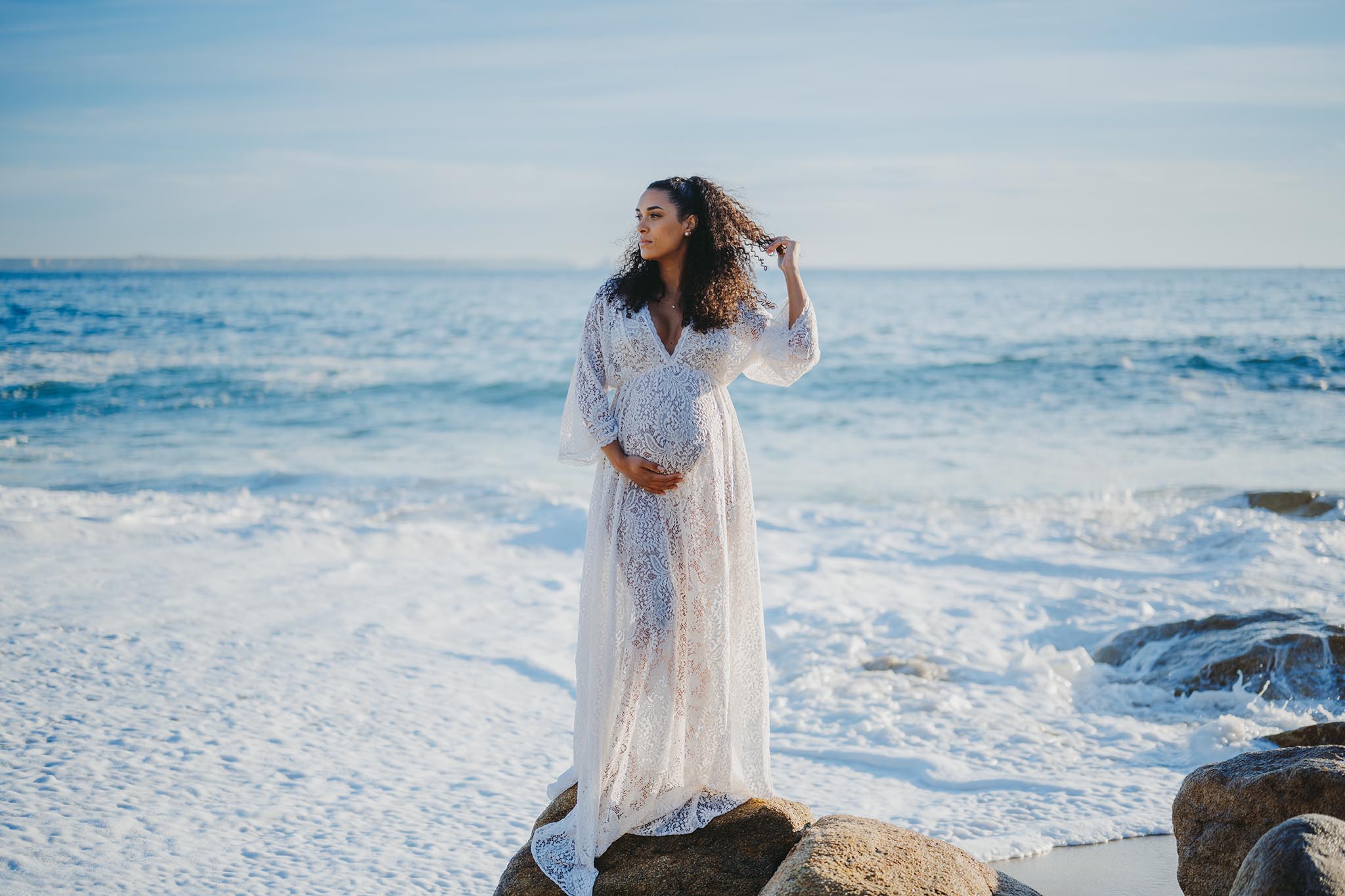 Photo de femme enceinte à la plage